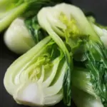 Producing short, broad, thick, pure white petioles and dark green, glossy leaves.