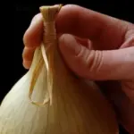 Once dried, tie the neck with Raffia